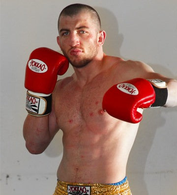 Askerov striking pose for fight