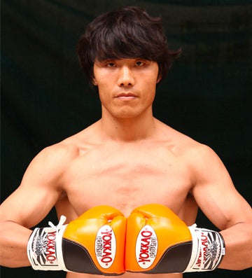 Fighter Bian in YOKKAO gear pose